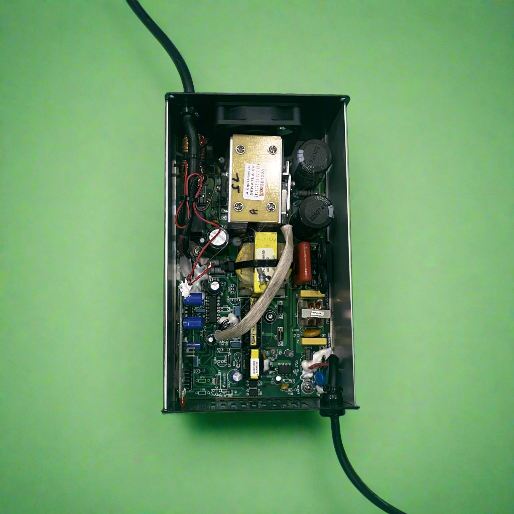 Internal SMPS board and DC fan inside Ampere OEM 66.8V 7.5A charger