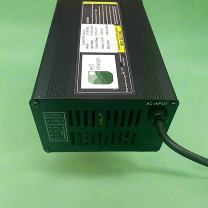 Ampere 66.8V 7.5A charger side view with LED indicator lights